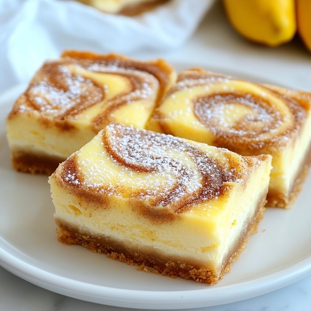 Creamy Holiday Cinnamon Swirl Cheesecake Bars Delight